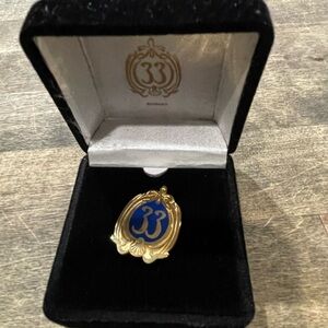 Elegant Gold and Blue Brooch